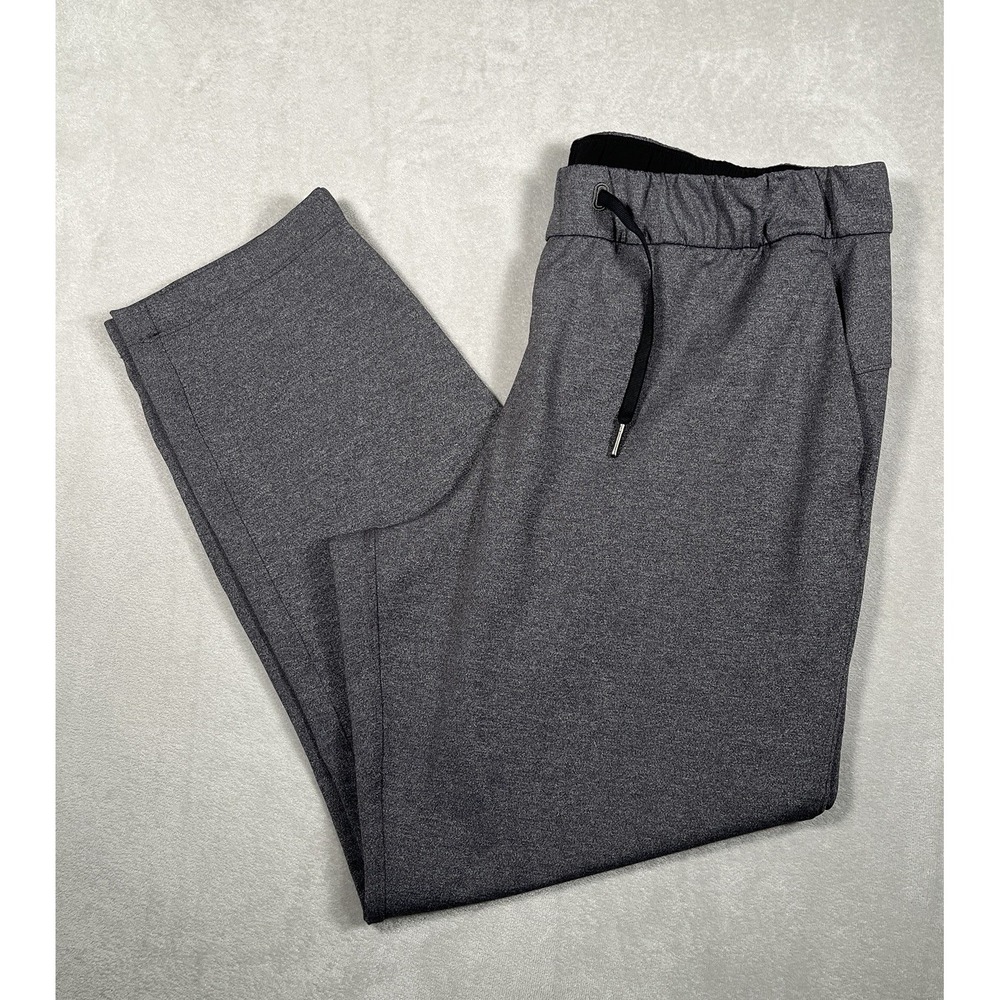 Lululemon Womens On The Fly Pant 27" Luxtreme Size 12 Heathered Black W5BSES